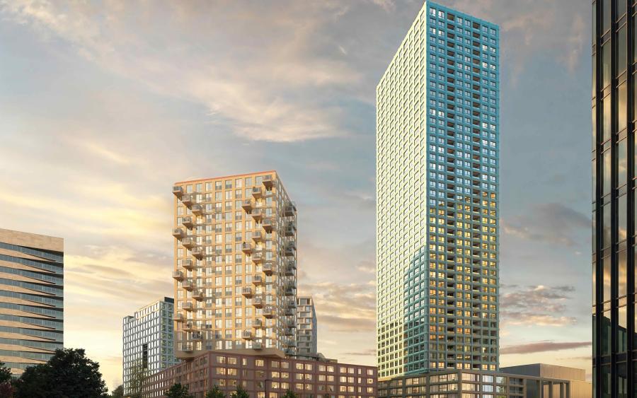 In Amsterdam Zuidoost verrijst de nieuwe stadswijk 'Eleven Square'. Onderdeel hiervan wordt de hoogste woontoren van Amsterdam van 145 meter en 44 verdiepingen hoog. Deze staat rechts op de foto.